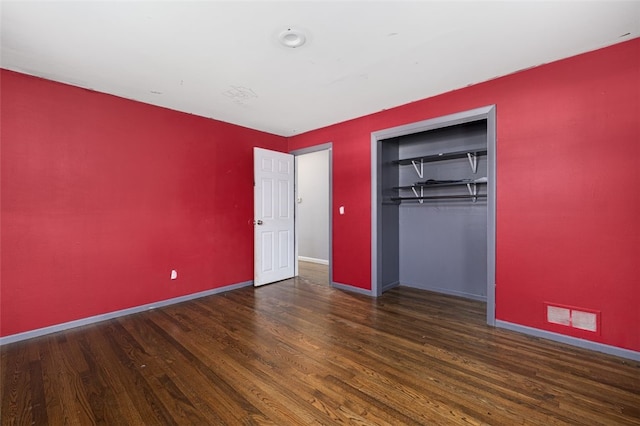94 Waterman Ave, Warwick, RI 02889 - unfurnished bedroom featuring wood finished floors and a closet