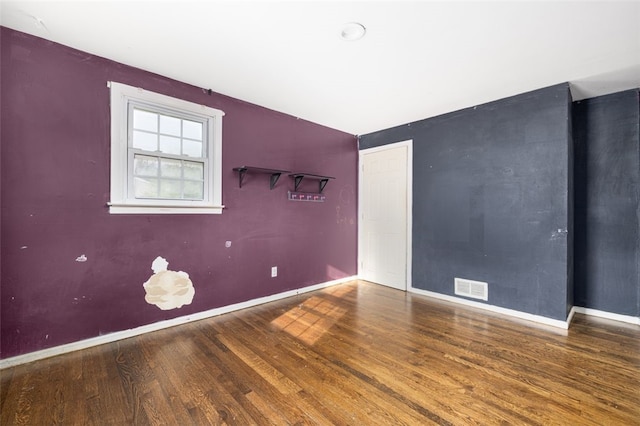 94 Waterman Ave, Warwick, RI 02889 - unfurnished room with wood finished floors