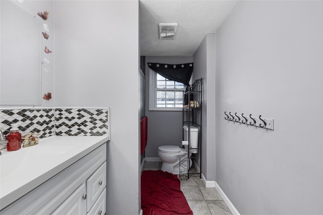 94 Waterman Ave, Warwick, RI 02889 - bathroom with vanity, decorative backsplash, and tile patterned floors