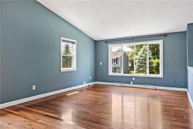 11 Tupelo Trl, Narragansett, RI 02882 - spare room featuring vaulted ceiling and hardwood / wood-style flooring
