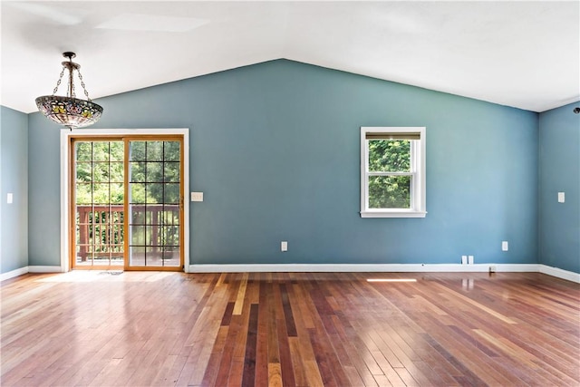 11 Tupelo Trl, Narragansett, RI 02882 - empty room with hardwood / wood-style flooring, healthy amount of natural light, and vaulted ceiling