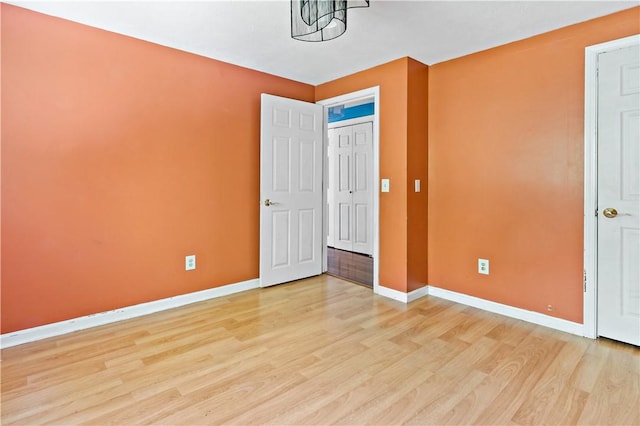 11 Tupelo Trl, Narragansett, RI 02882 - unfurnished bedroom with light wood finished floors and baseboards