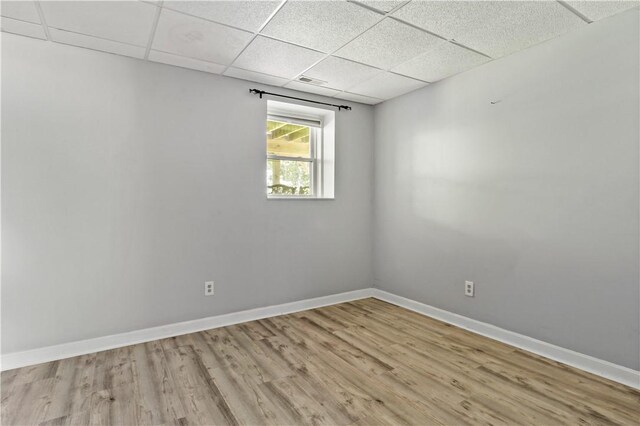 11 Tupelo Trl, Narragansett, RI 02882 - spare room with a drop ceiling and wood finished floors