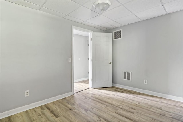 11 Tupelo Trl, Narragansett, RI 02882 - spare room with a paneled ceiling and wood finished floors