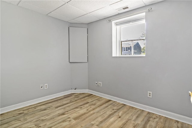 11 Tupelo Trl, Narragansett, RI 02882 - empty room featuring wood finished floors and a drop ceiling