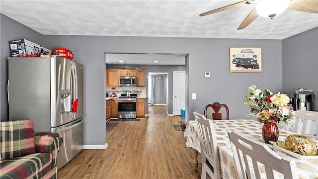 26 Grafton St Unit 3, Providence, RI 02904 - dining area featuring a ceiling fan and light wood-style flooring