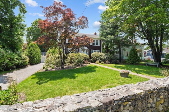 112 County Rd, Barrington, RI 02806 - obstructed view of property with a front lawn and a chimney