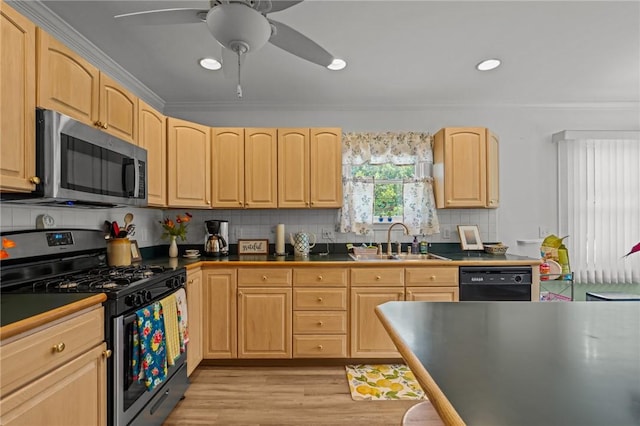 112 County Rd, Barrington, RI 02806 - kitchen with range with gas stovetop, stainless steel microwave, dishwasher, light brown cabinets, and light wood-style floors