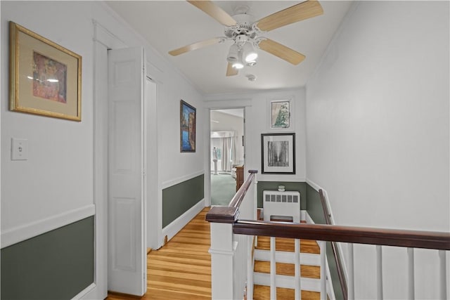112 County Rd, Barrington, RI 02806 - hallway featuring light wood-type flooring, ornamental molding, and an upstairs landing