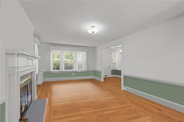 112 County Rd, Barrington, RI 02806 - unfurnished living room with a fireplace with flush hearth and light wood-style floors
