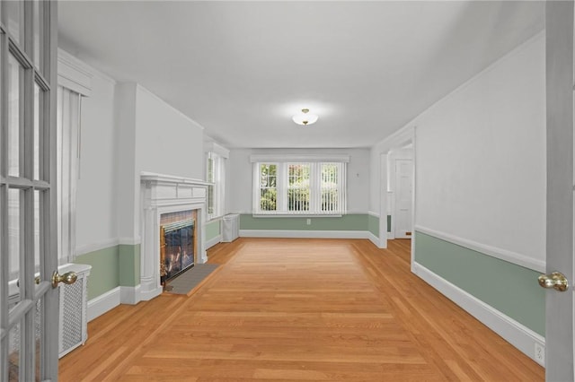 112 County Rd, Barrington, RI 02806 - unfurnished living room with a fireplace with flush hearth and light wood-style flooring