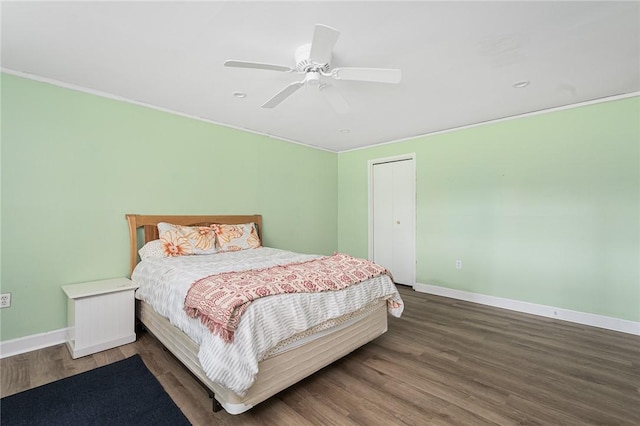 401 Bellevue Ave Unit 100, Newport, RI 02840 - bedroom with wood finished floors, ceiling fan, a closet, and ornamental molding
