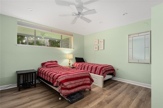 401 Bellevue Ave Unit 100, Newport, RI 02840 - bedroom with wood finished floors, ceiling fan, and recessed lighting
