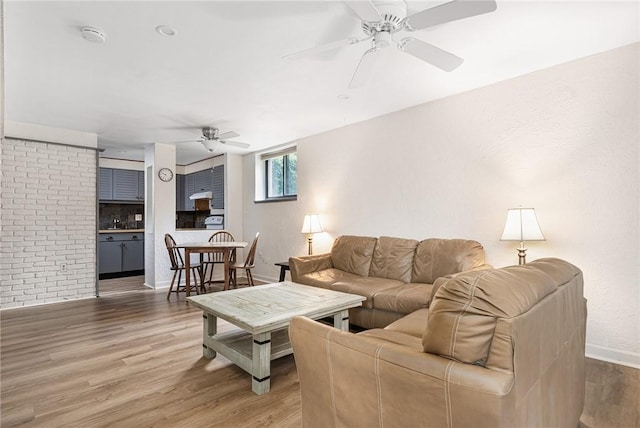 401 Bellevue Ave Unit 100, Newport, RI 02840 - living area featuring a ceiling fan and light wood-style floors
