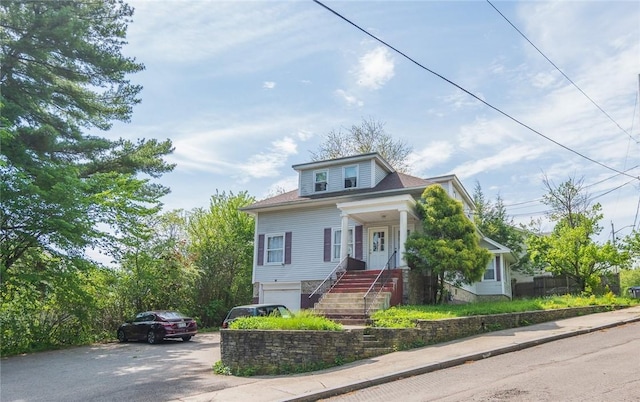 201 Hillcrest Ave, Providence, RI 02909 - view of front facade with asphalt driveway and a garage