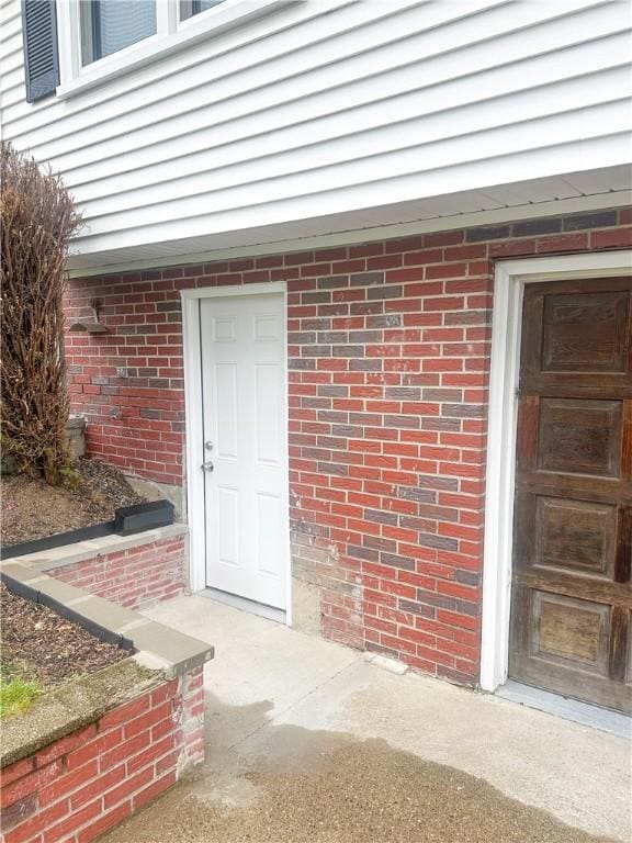 253 Nelson St, Providence, RI 02908 - view of exterior entry with brick siding