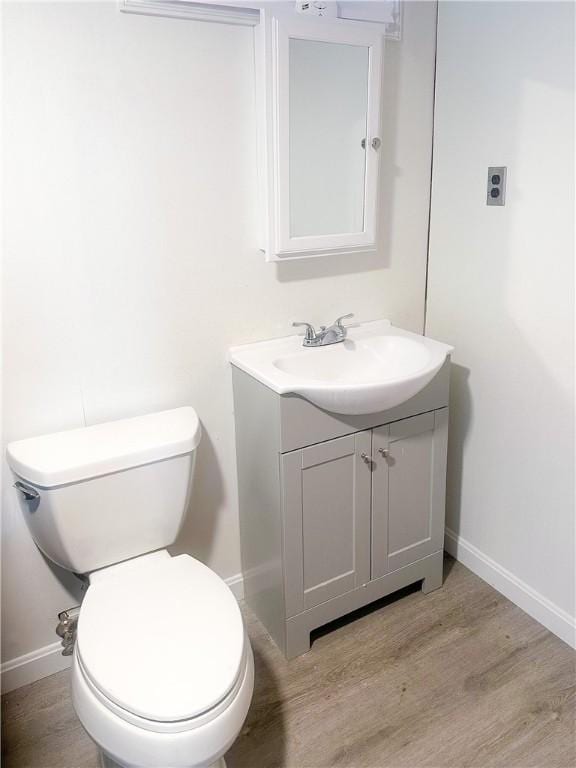 253 Nelson St, Providence, RI 02908 - bathroom featuring vanity and wood finished floors