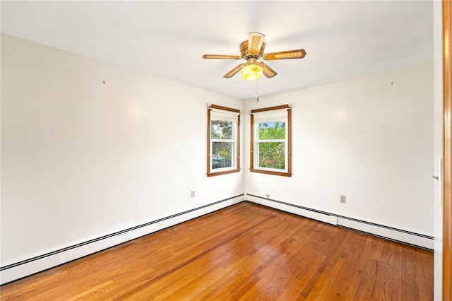 253 Nelson St, Providence, RI 02908 - empty room with wood finished floors, ceiling fan, and baseboard heating