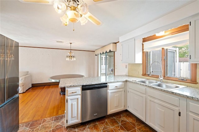 253 Nelson St, Providence, RI 02908 - kitchen with appliances with stainless steel finishes, healthy amount of natural light, a peninsula, and a ceiling fan