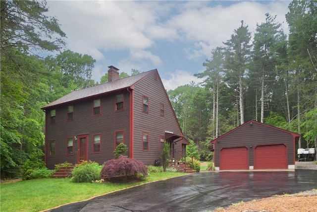 536 Douglas Hook Rd, Glocester, RI 02814 - view of side of property featuring a detached garage, an outdoor structure, and a chimney