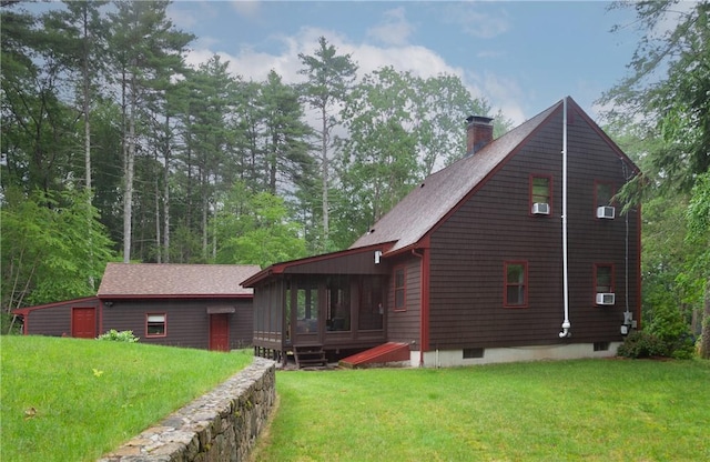 536 Douglas Hook Rd, Glocester, RI 02814 - back of property with a chimney, a lawn, a sunroom, and cooling unit