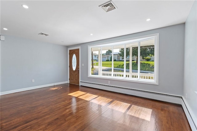 57 Wilson Ave, Johnston, RI 02919 - entryway featuring baseboard heating, wood finished floors, and recessed lighting