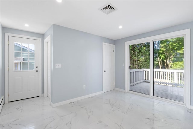 57 Wilson Ave, Johnston, RI 02919 - doorway to outside with plenty of natural light, recessed lighting, and light marble finish floors