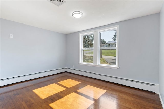 57 Wilson Ave, Johnston, RI 02919 - spare room with wood finished floors and baseboard heating