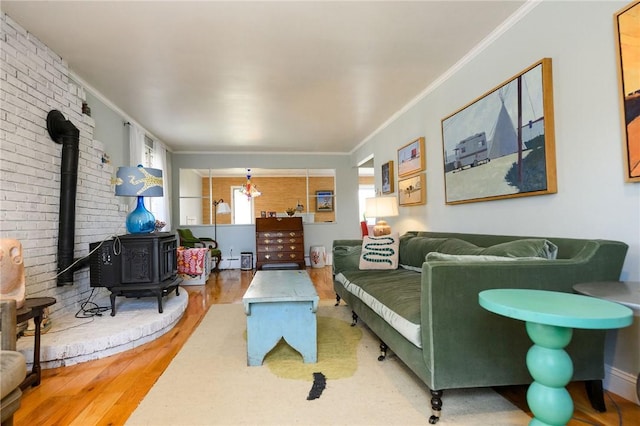 21 Carpenter Ave, Barrington, RI 02806 - living room with a wood stove, crown molding, and wood finished floors