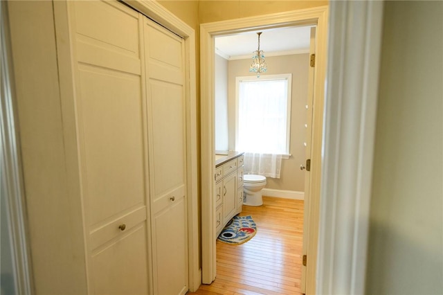 21 Carpenter Ave, Barrington, RI 02806 - hall with ornamental molding and light wood finished floors