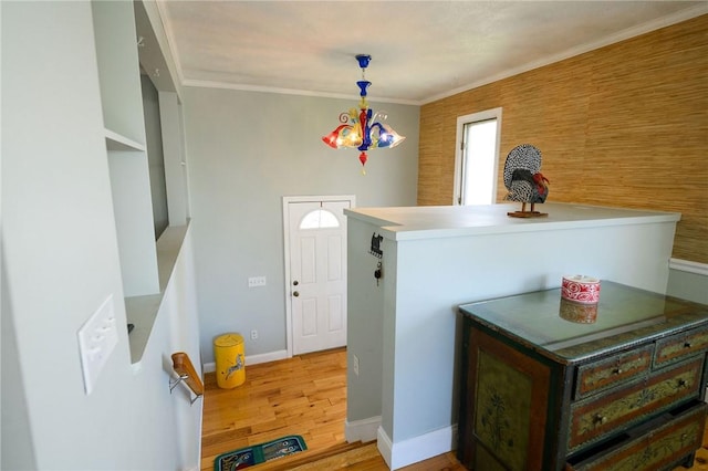 21 Carpenter Ave, Barrington, RI 02806 - entryway featuring light wood-style flooring, a chandelier, and crown molding