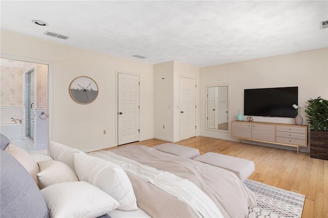9 Beacon Hill Dr, Warwick, RI 02886 - bedroom featuring light wood-style floors and ensuite bathroom