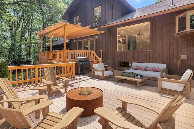 9 Beacon Hill Dr, Warwick, RI 02886 - deck featuring a grill, a pergola, and an outdoor living space with a fire pit