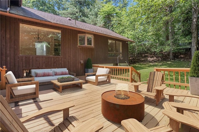 9 Beacon Hill Dr, Warwick, RI 02886 - deck with an outdoor living space with a fire pit