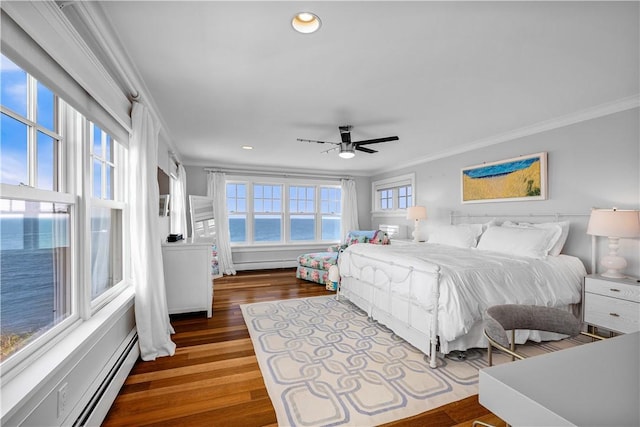 1210 Graces Cove Rd, Block Island, RI 02807 - bedroom with ornamental molding, a baseboard heating unit, recessed lighting, wood finished floors, and a ceiling fan