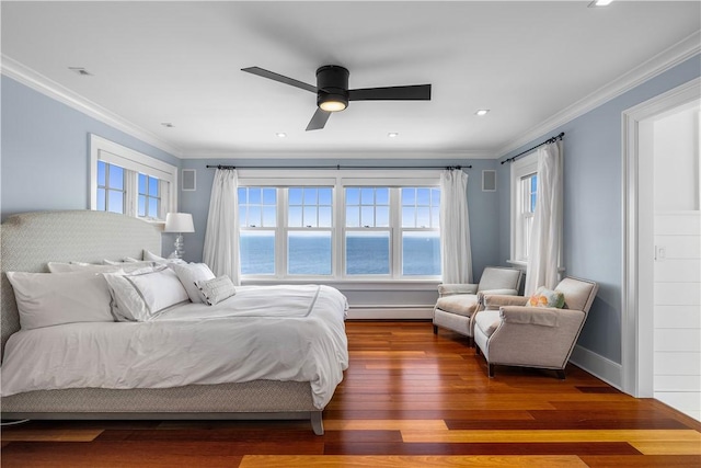 1210 Graces Cove Rd, Block Island, RI 02807 - bedroom featuring wood finished floors, crown molding, ceiling fan, recessed lighting, and baseboard heating