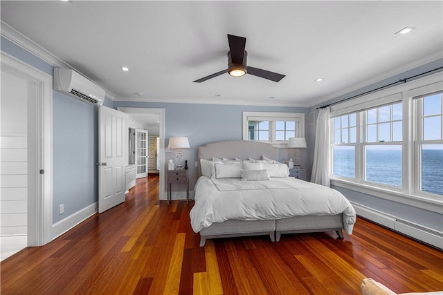 1210 Graces Cove Rd, Block Island, RI 02807 - bedroom with an AC wall unit, wood finished floors, ornamental molding, a water view, and ceiling fan