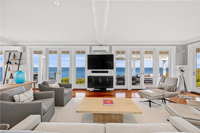 1210 Graces Cove Rd, Block Island, RI 02807 - living room featuring a wall mounted air conditioner, wood finished floors, crown molding, french doors, and recessed lighting