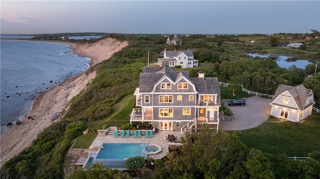 1210 Graces Cove Rd, Block Island, RI 02807 - view of subject property with a pool area and a large body of water