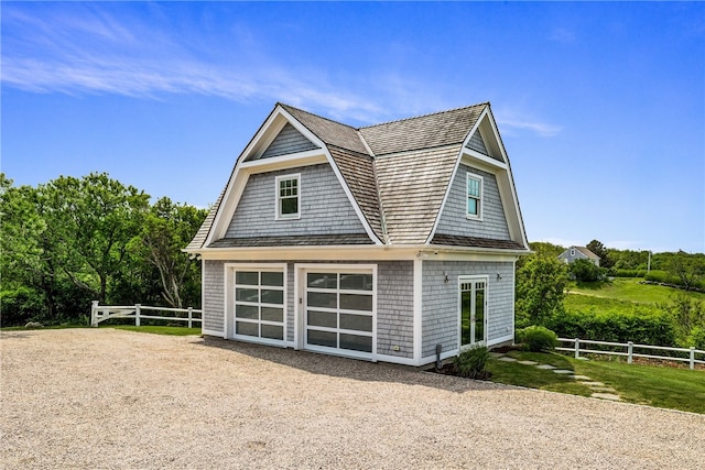 1210 Graces Cove Rd, Block Island, RI 02807 - view of front facade with a gambrel roof