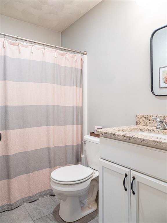 19 Revere Ave, West Warwick, RI 02893 - bathroom with vanity and tile patterned floors