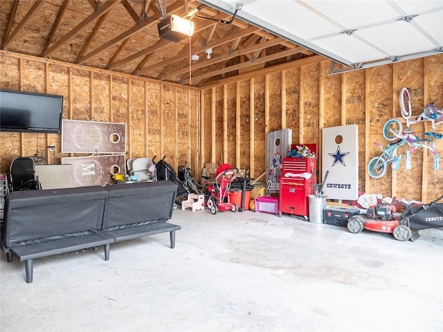 19 Revere Ave, West Warwick, RI 02893 - garage featuring a garage door opener