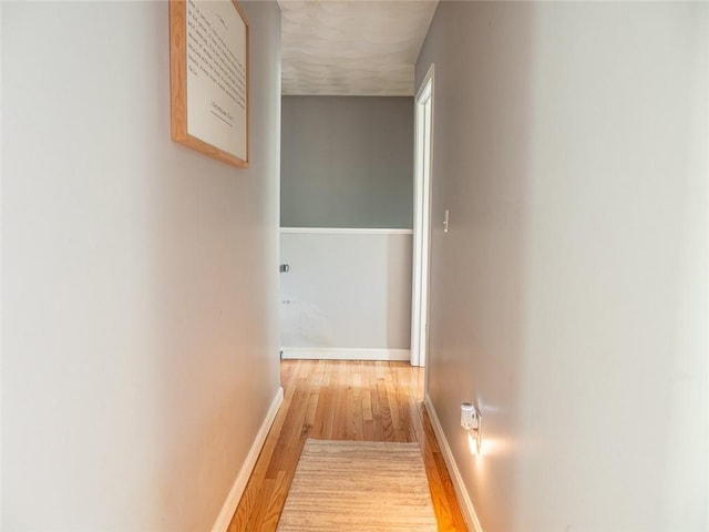 19 Revere Ave, West Warwick, RI 02893 - hallway featuring wood finished floors and baseboards