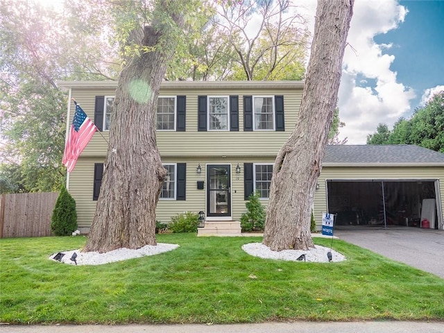 19 Revere Ave, West Warwick, RI 02893 - colonial inspired home featuring an attached garage, concrete driveway, and entry steps