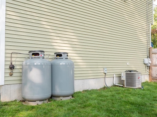 19 Revere Ave, West Warwick, RI 02893 - view of property exterior with a central AC unit