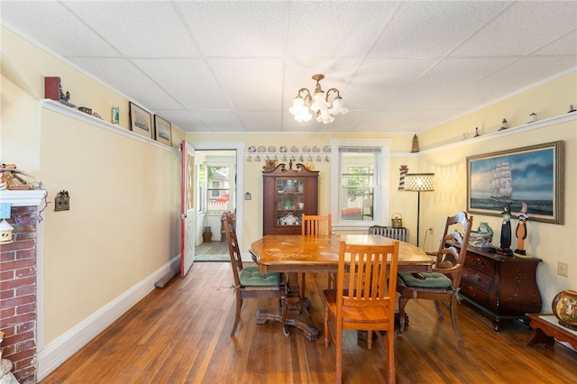49 Palmer Ave, Warwick, RI 02889 - dining area with hardwood / wood-style floors and a chandelier