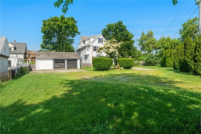 49 Palmer Ave, Warwick, RI 02889 - view of yard with a detached garage and an outbuilding