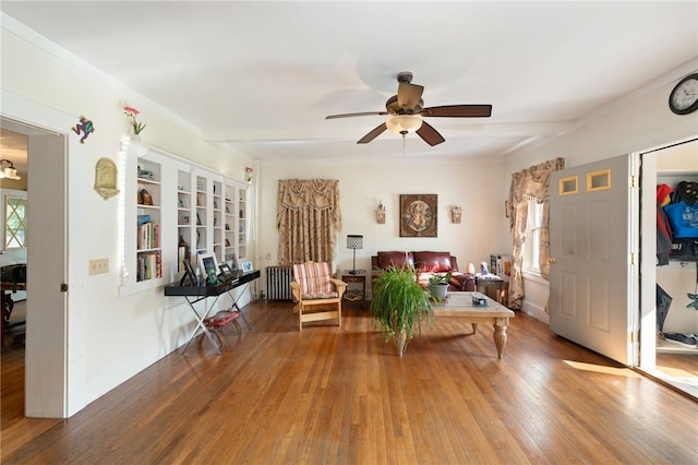 49 Palmer Ave, Warwick, RI 02889 - living room featuring a ceiling fan, plenty of natural light, and wood finished floors