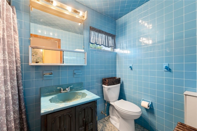 49 Palmer Ave, Warwick, RI 02889 - bathroom with tile walls, vanity, and tile patterned floors