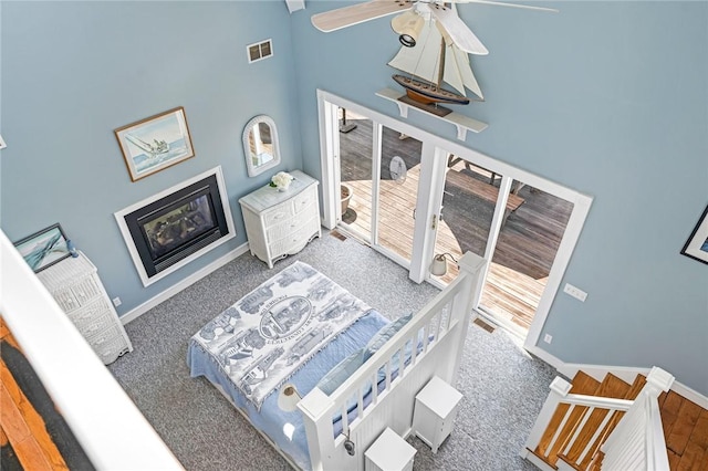 37 Teal Rd, South Kingstown, RI 02879 - bedroom featuring a towering ceiling, carpet, ceiling fan, and access to outside